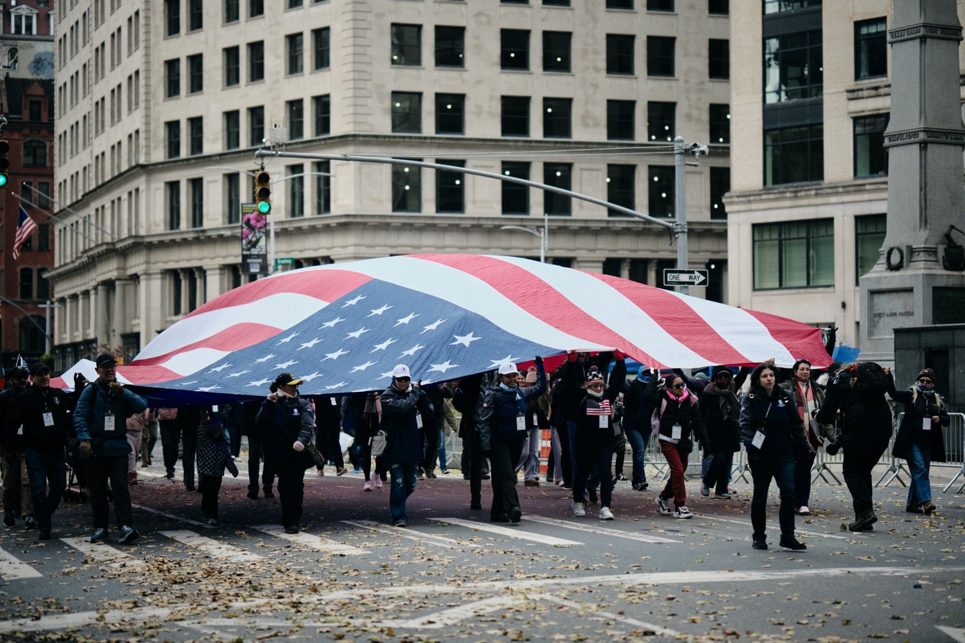 Vietnam veteran and U.S. Army veteran walking together at a parade